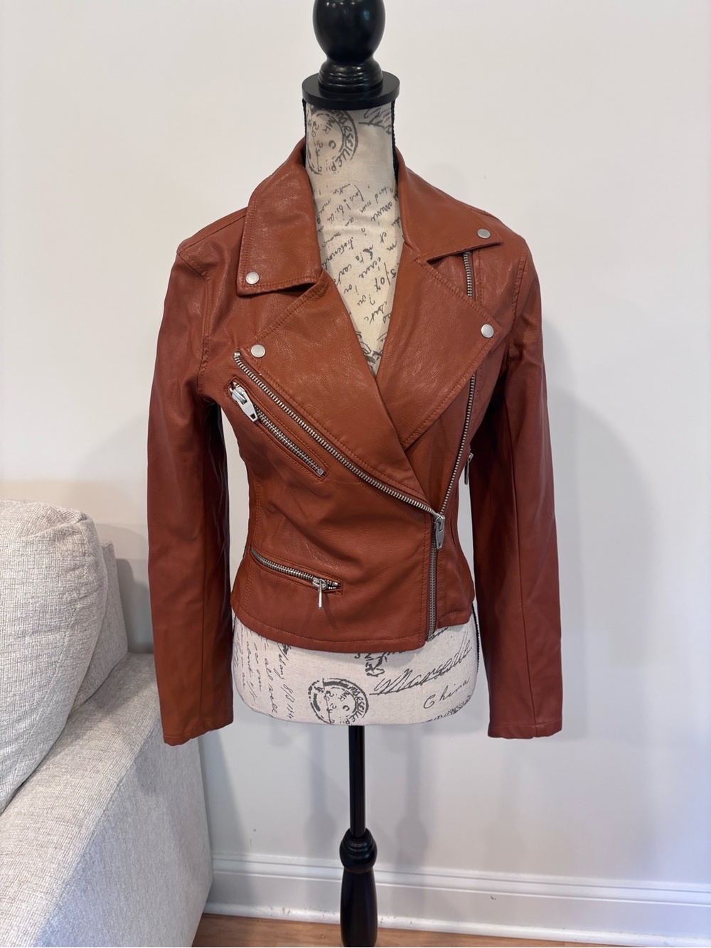 BLANKNYC Good Vibes Faux Leather Moto Jacket in the cognac brown size small